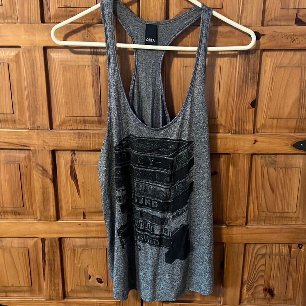 Adorable razor back stacks of books obey tank